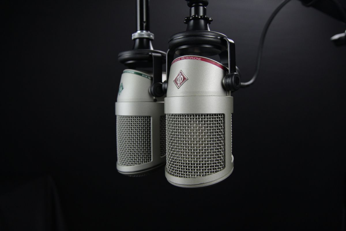 Studio microphones representing the audio you'll convert to text
